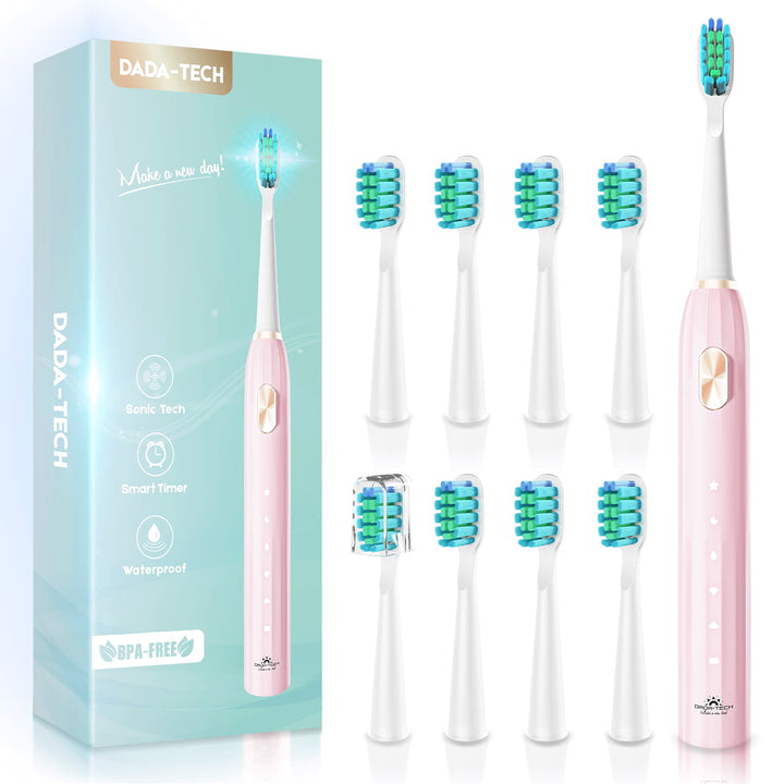 Dada-Tech pink electric toothbrush with 8 extra brush heads (one with brush cap) and a package